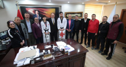 TAEKWONDO KAFİLESİ’NDEN GENÇ’E ZİYARET